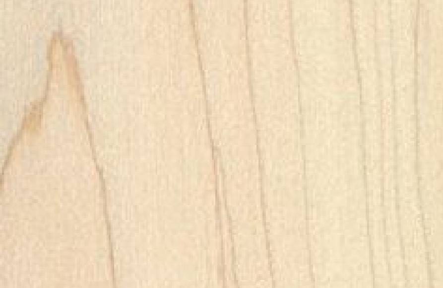 A close up of the wood grain on a wooden surface.